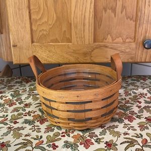 Longaberger 1994 Small Round Basket w/Leather Handles and Plastic Protector.
